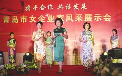 高丽新:将旗袍装扮成产业